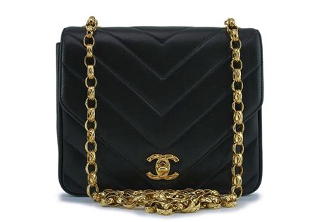 chanel gold coin bag|Chanel bag with gold chain.